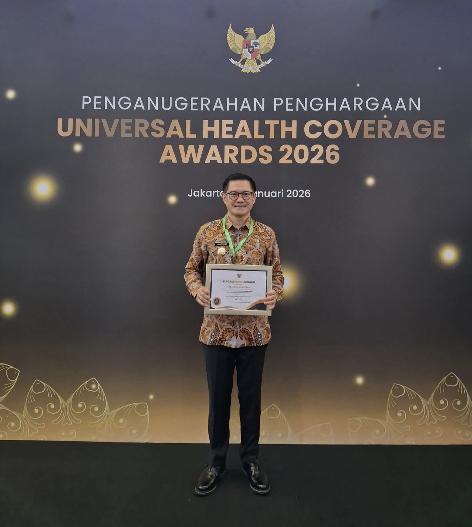 Di Kepemimpinan Bupati Joune Ganda Kabupaten Minut Berhasil Rain Penghargaan UHC Award Tahun 2026 Kategori Madya
