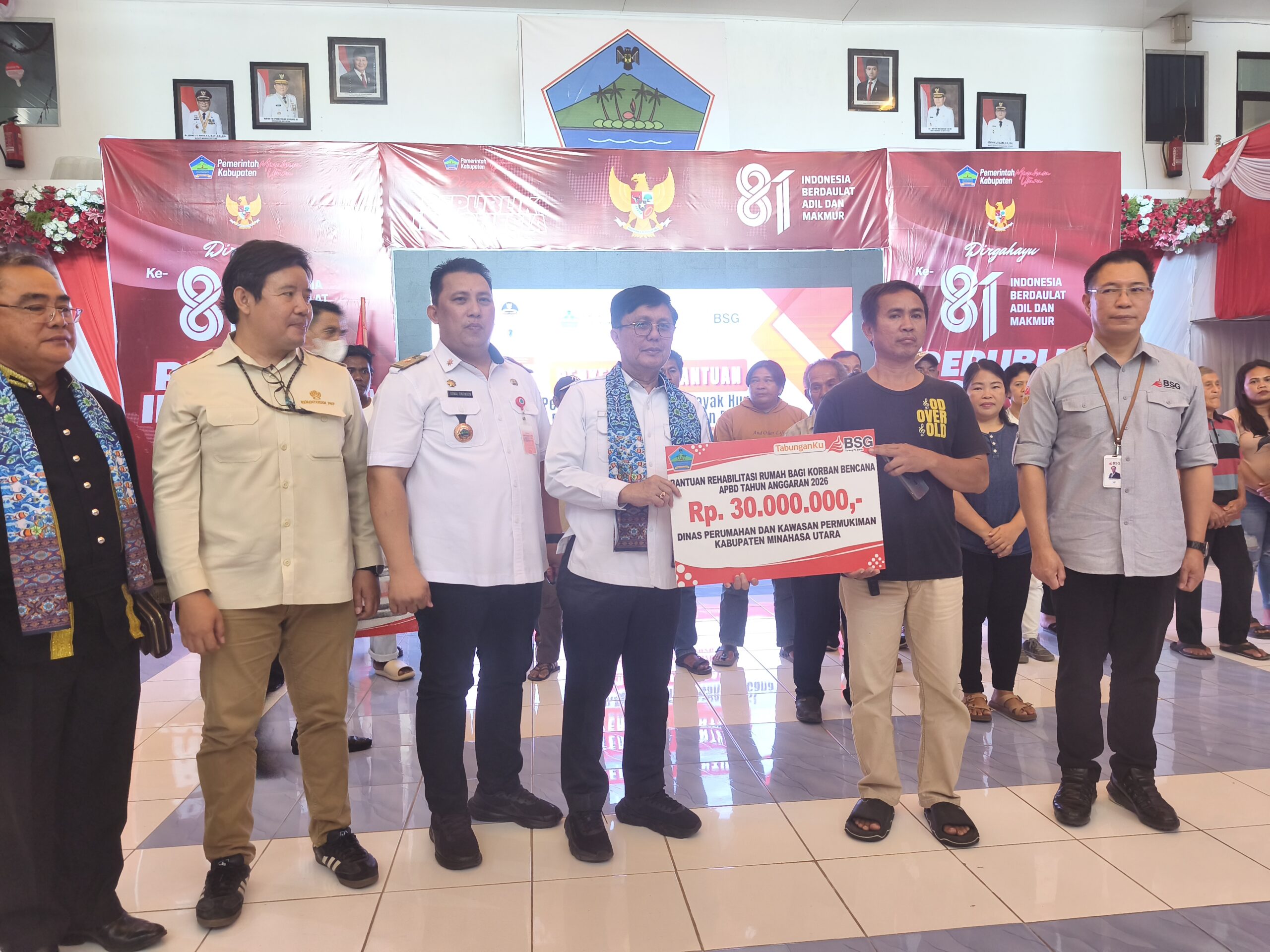 Pemkab Minut Salurkan Bantuan Dana Perbaikan RTLH dan Bantuan Perbaikan Rumah Bagi Korban Bencana